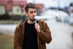 Man Vaping