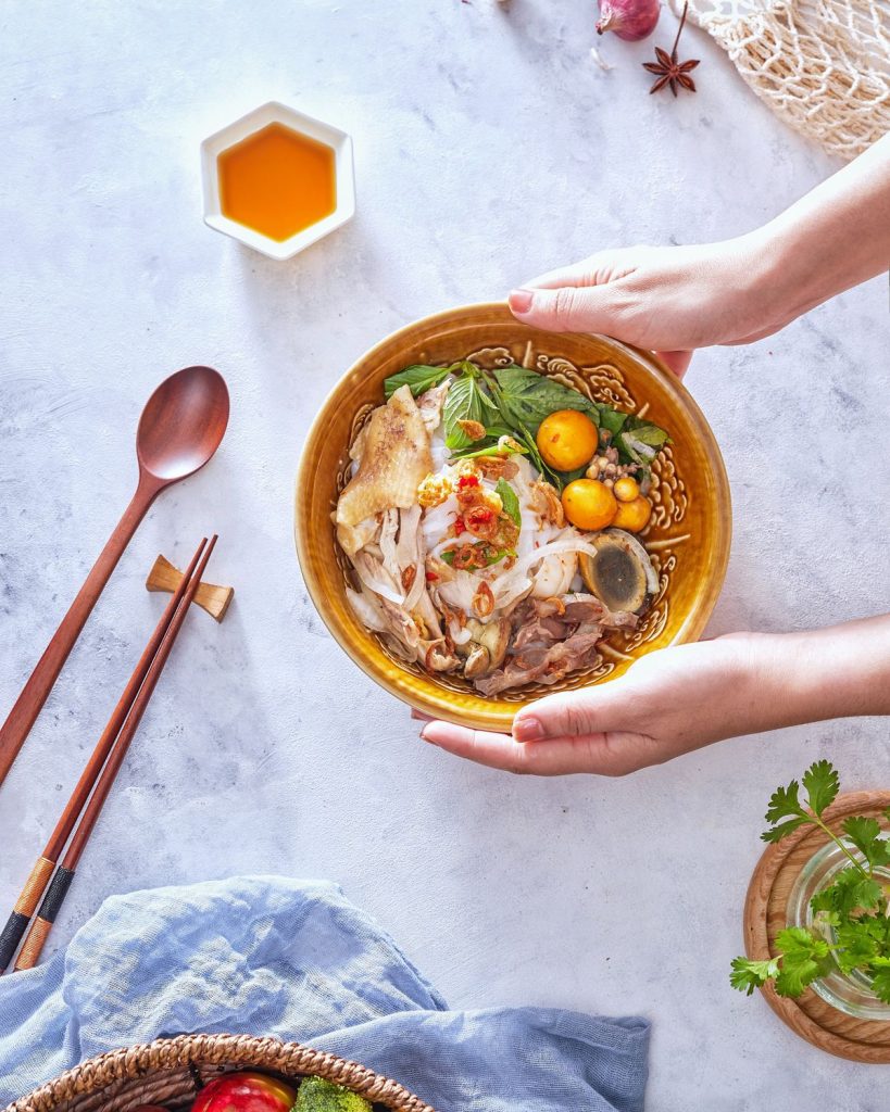 Vietnamese chicken pho being served