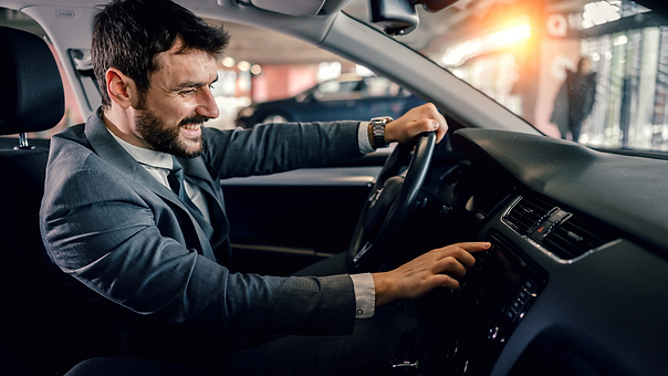 man changing radio station