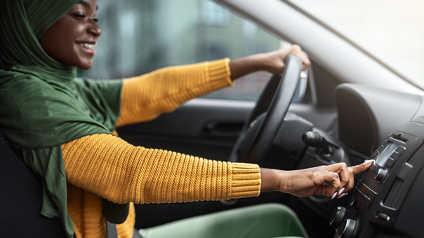 happy lady changing the station